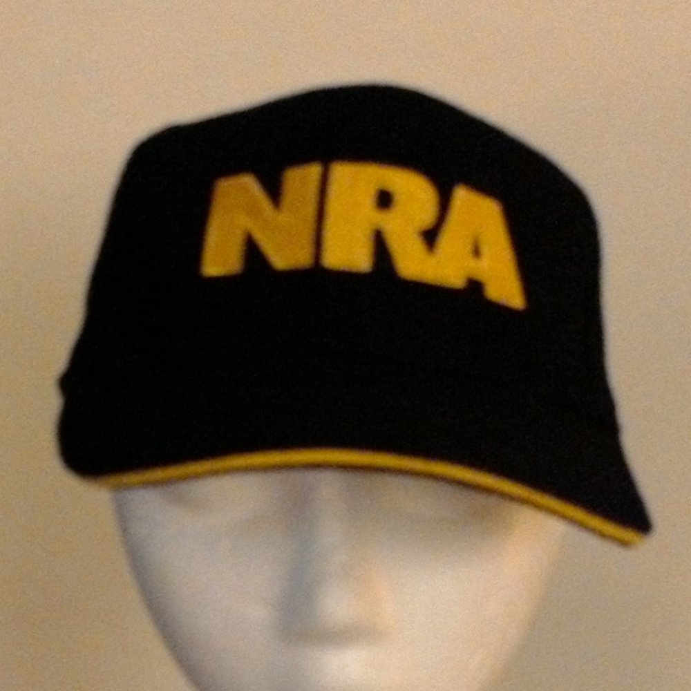 NRA black baseball cap with gold trim on bill
